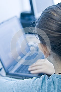 Teen girl learning computers