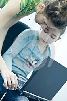 Teen girl learning computers