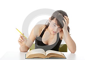 Teen girl learning at the desk