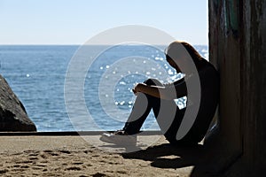 Teen girl lonely and sadness on the beach