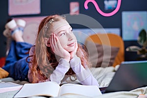 Teen Girl Looking Away While Daydreaming