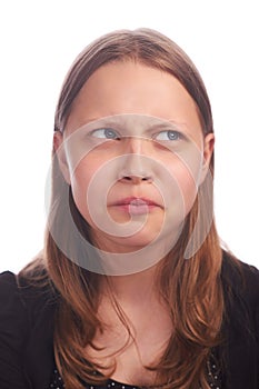 Teen girl making funny faces on white background