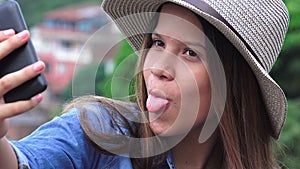 Teen Girl Making Goofy Funny Faces For Selfy