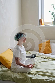 Teen Girl Meditating At Home