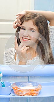 Teen girl in the mirror