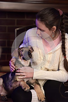 Teen girl with puppie