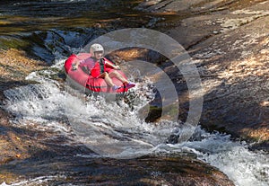 Teen girl rafting