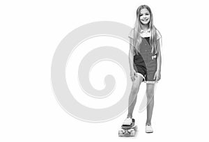 teen girl with skateboard on background, advertisement. photo of teen girl with skateboard. photo