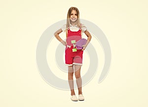 teen girl skateboarding  on white background. teen girl skateboarding in studio. photo