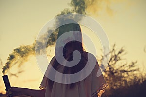 Teen girl with smoke bomb