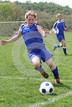 Teen Girl Soccer Player In Action 2