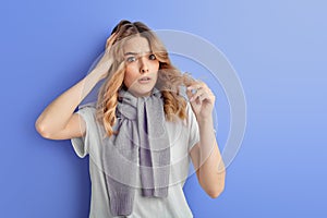 teen girl is stressed, stand with hand on head. Cute young caucasian teenager fears and upset for mistake