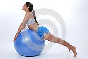 Teen Girl Stretching on Exercise Ball