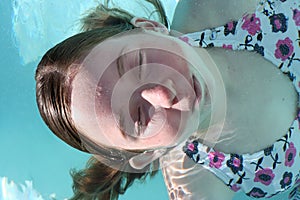 Teen girl submerging