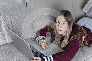 Teen girl surprised by her parents monitoring of her online screen time