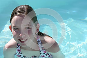 Teen girl swimming