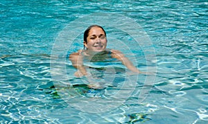 Teen girl swimming