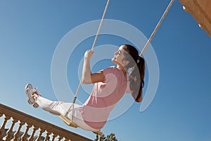 Teen girl on swing