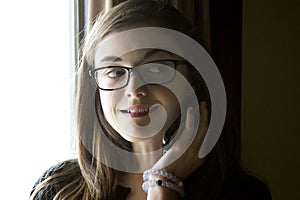 Teen girl talking on the phone