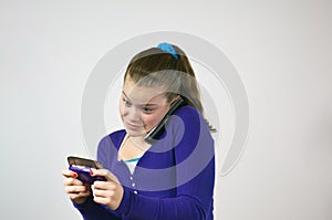 Teen girl texting and talking