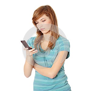 Teen girl using cell phone