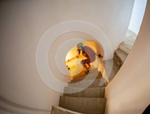 Teen girl walking up the stairs discovering new secrets