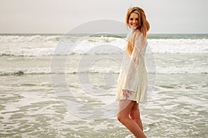 Teen girl in the water at the beach