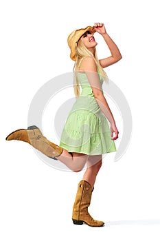 Teen girl wearing hat and boots