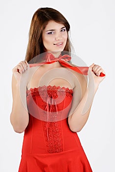 Teen girl wearing red dress