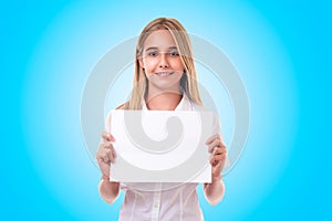 Teen girl in white shirt holding advertising sign board. ,isolated