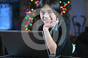 Teen girl working on the laptop 3