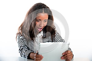 Teen girl, working with a portable tablet computer