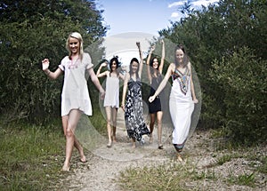 Teen girls on dirt path