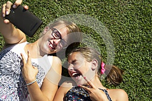 Teen girls taking selfie