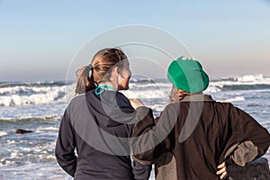 Teen Girls Talk Beach Waves