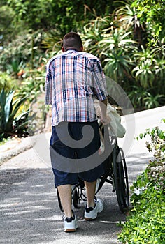 Teen Helping Grandparent photo