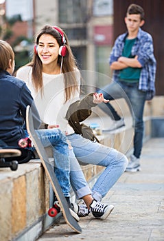 Teen and his friends after conflict outdoors