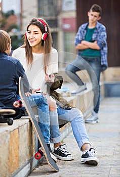 Teen and his friends after conflict outdoors