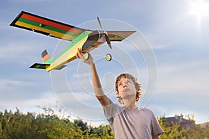 Teen with homemade radio-controlled model