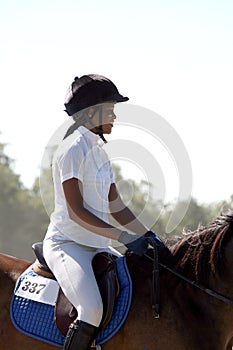 Teen at horse competition