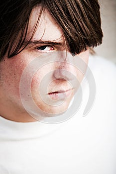 Teen male looking angry