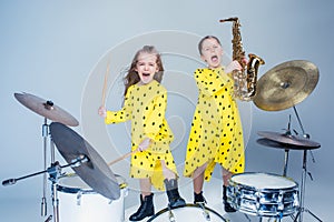 The teen music band performing in a recording studio