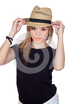 Teen rebellious girl with a straw cap