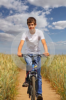 Teen riding a bicycle