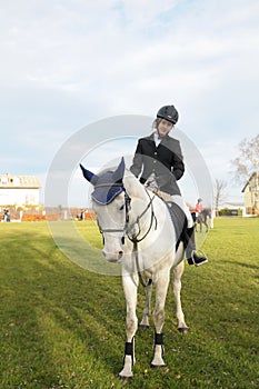 Teen riding horse