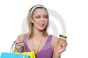 Teen shopping and paying with a credit card