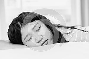 Teen sleeping black and white monotone