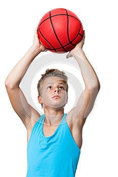 Teen sportsman holding basketball.