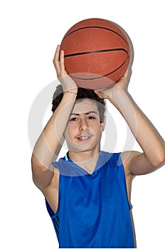 Teen sportsman playing basketball