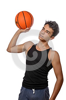 Teen sportsman with sportswear playing basketball. White background.